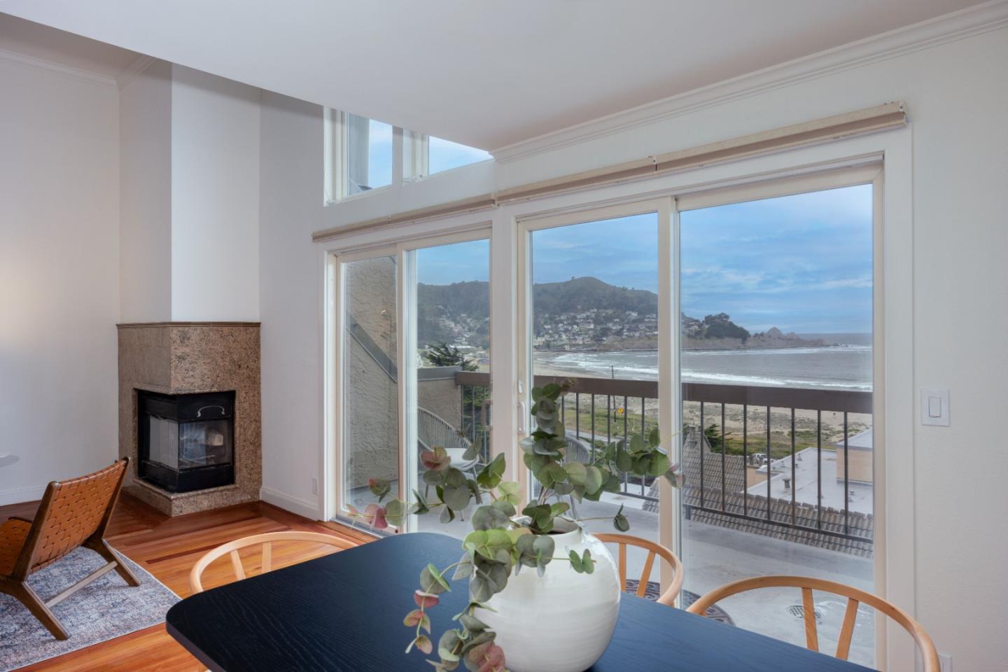 445 Roberts Road Pacifica, CA 94044 - Photo 9 of 40 a living room with furniture and a fireplace