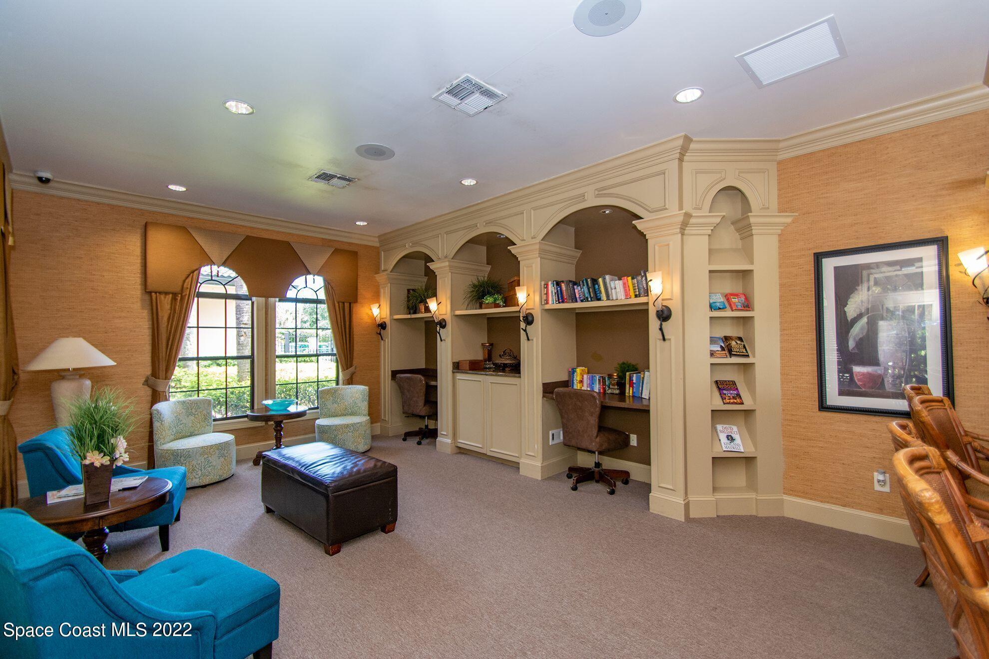 6460 Borasco Drive, Unit 1902 Melbourne, FL 32940 - Photo 17 of 36 a living room with furniture and a window