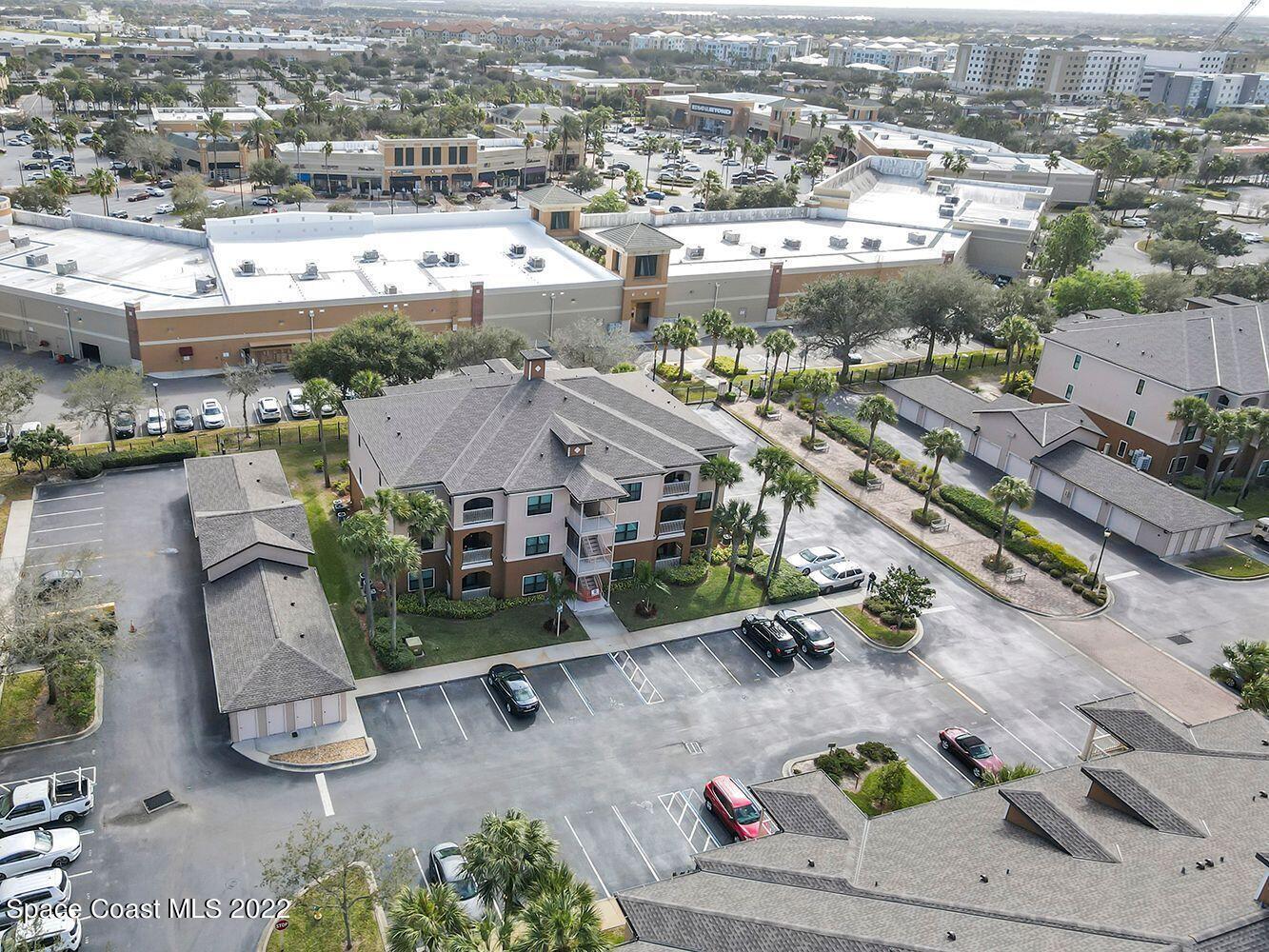 6460 Borasco Drive, Unit 1902 Melbourne, FL 32940 - Photo 19 of 36 an aerial view of a city