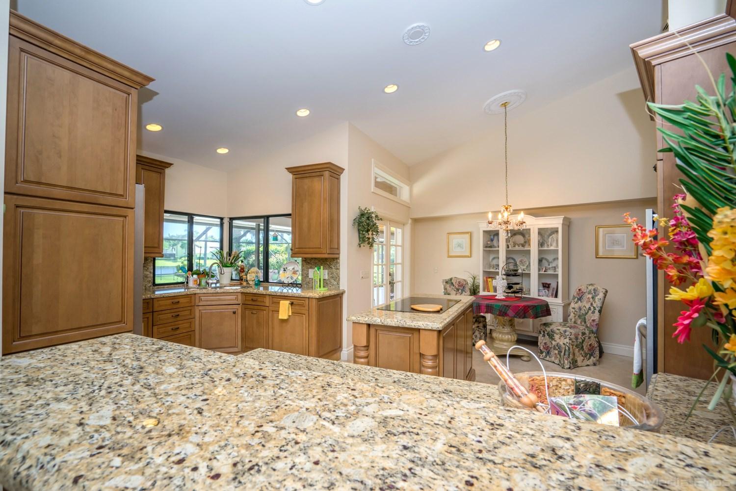 6620 Wood Lake Road Jupiter, FL 33458 - Photo 8 of 42 Large Custom Island Kitchen