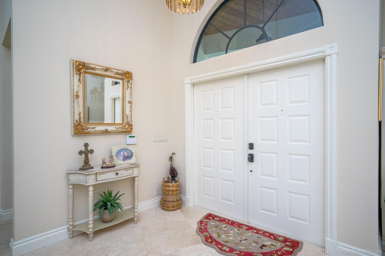 6620 Wood Lake Road Jupiter, FL 33458 - Photo 9 of 42 Entry - Foyer