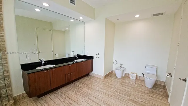 a view of a terrace with a table and chairs