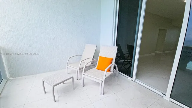 a view of furniture and window in a room