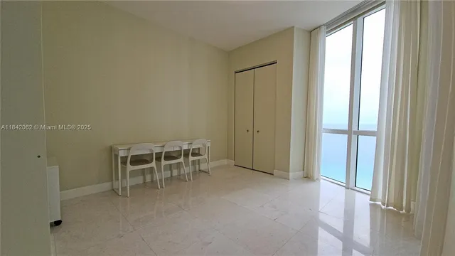 a view of backyard with tub