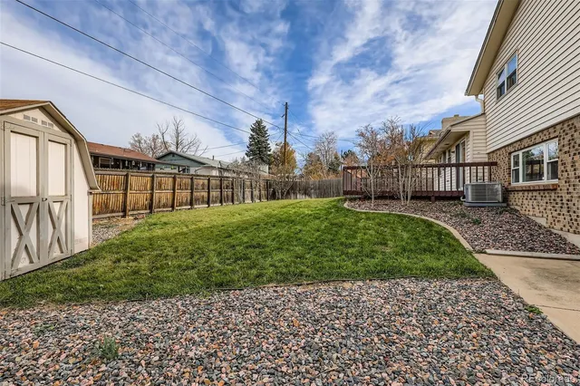 a view of a garden from a porch