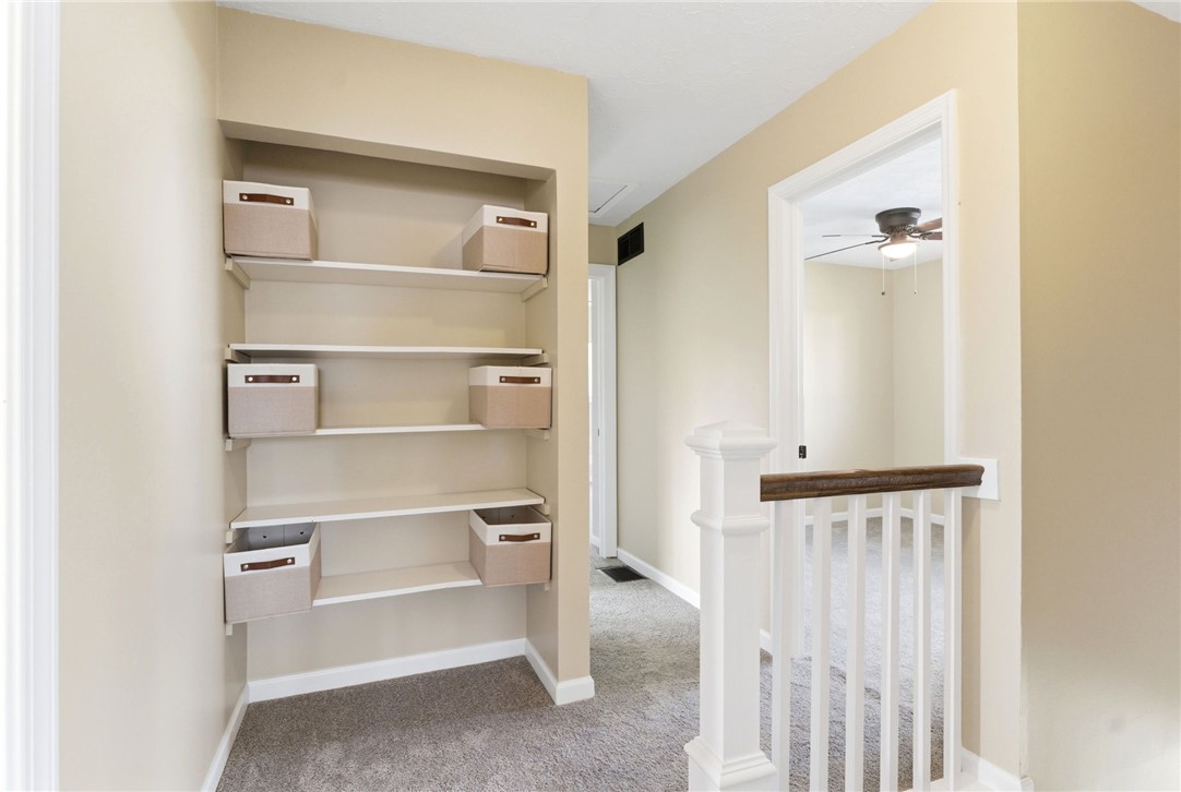 40 Woods Road Springboro, OH 45066 - Photo 51 of 57 This cozy interior hallway features built-in shelving, perfect for organized living.