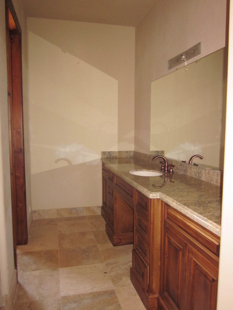 6600 East Doubletree Ranch Road Paradise Valley, AZ 85253 - Photo 29 of 42 a bathroom with a granite countertop sink and a mirror