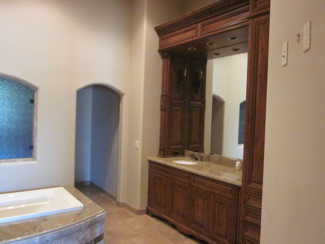 6600 East Doubletree Ranch Road Paradise Valley, AZ 85253 - Photo 31 of 42 a bathroom with a sink and a mirror