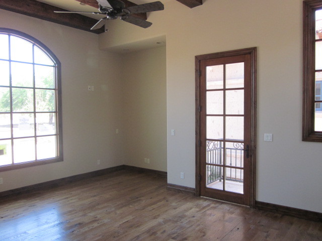 6600 East Doubletree Ranch Road Paradise Valley, AZ 85253 - Photo 6 of 42 an empty room with windows and closet