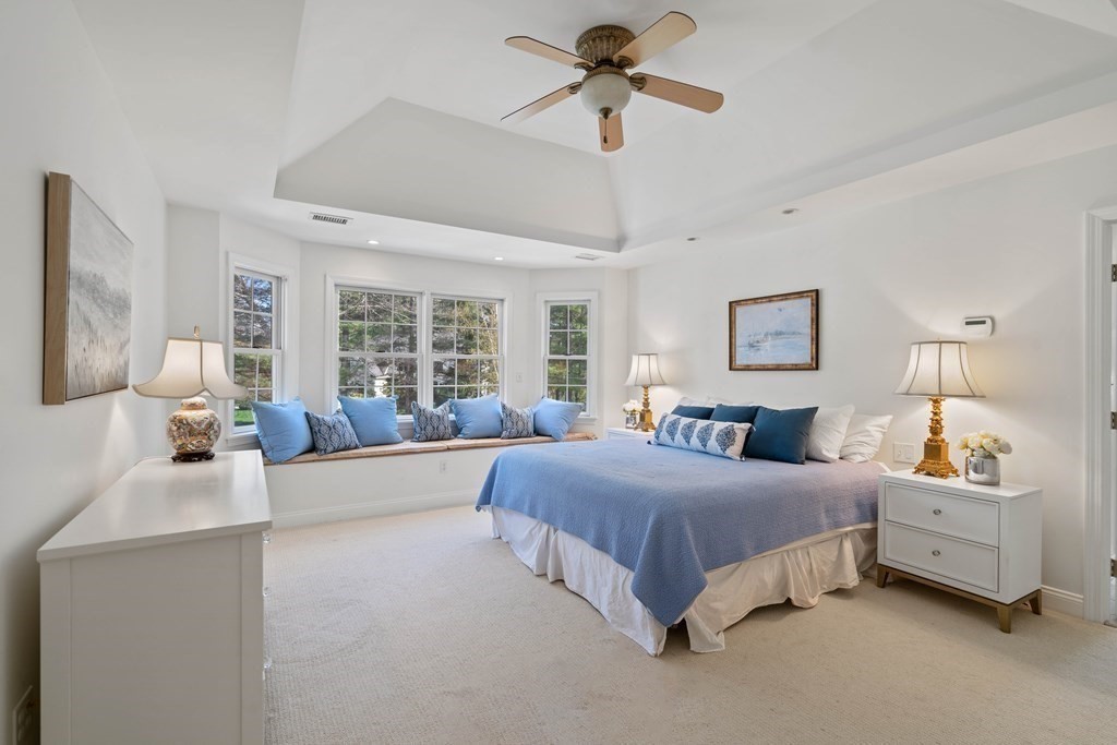 137 Randall Road Stow, MA 01775 - Photo 14 of 38 a bedroom with a bed couch and window