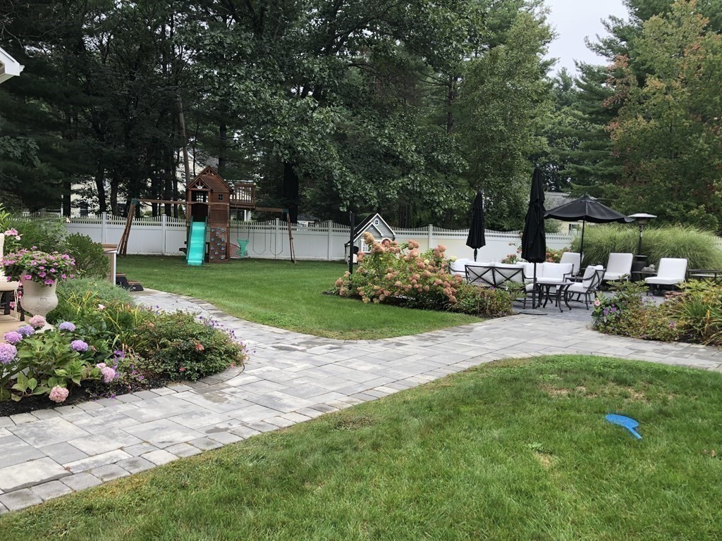 137 Randall Road Stow, MA 01775 - Photo 35 of 38 a view of a garden with patio