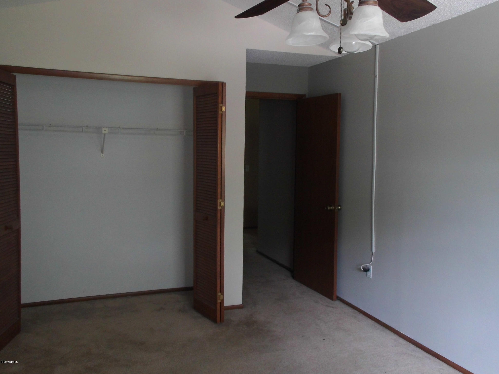 1616 Clover Circle Melbourne, FL 32935 - Photo 17 of 20 Upstairs Bedroom 2