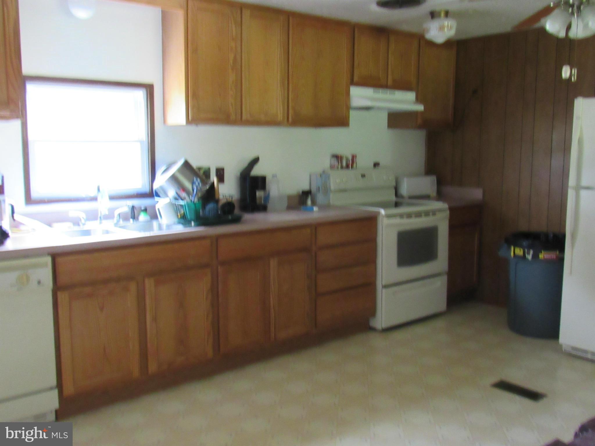 172 Rogers Mill Road Strasburg, VA 22657 - Photo 9 of 23 a kitchen with a sink and cabinets