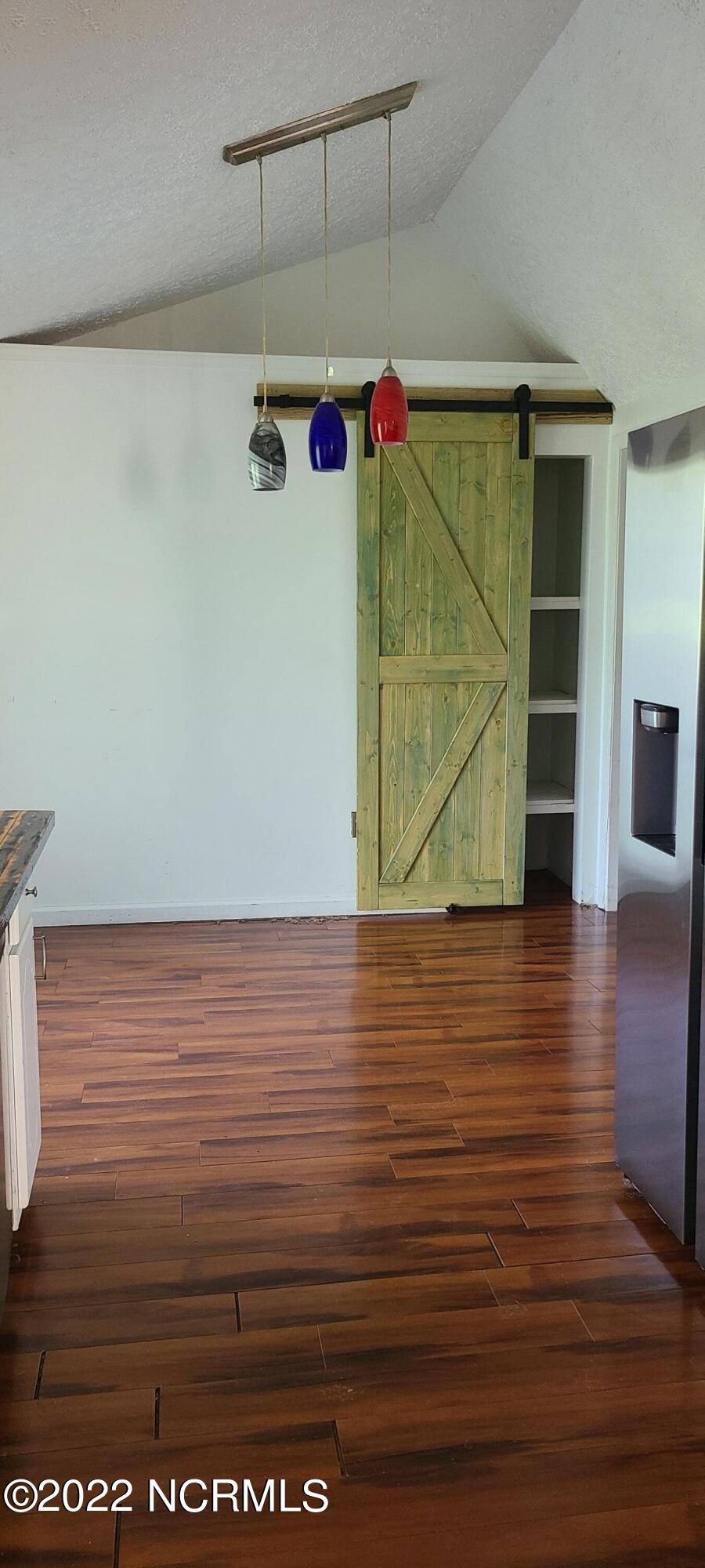 406 Austin Road Beaufort, NC 28516 - Photo 6 of 16 Pantry with funky barn door
