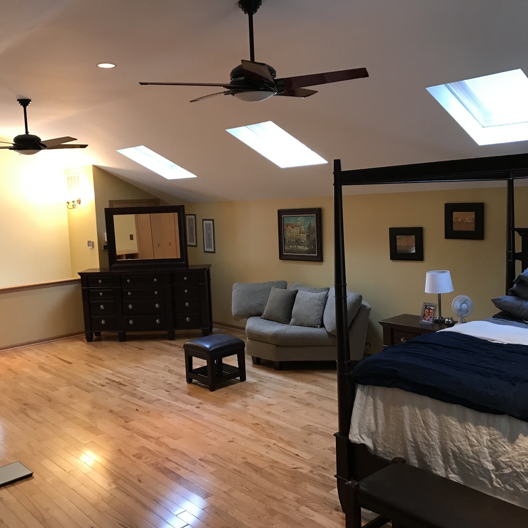 3110 South Racine Avenue Chicago, IL 60608 - Photo 12 of 23 a living room with furniture and a flat screen tv