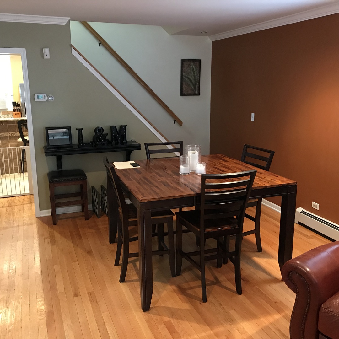3110 South Racine Avenue Chicago, IL 60608 - Photo 3 of 23 a dinning table and chairs in a room