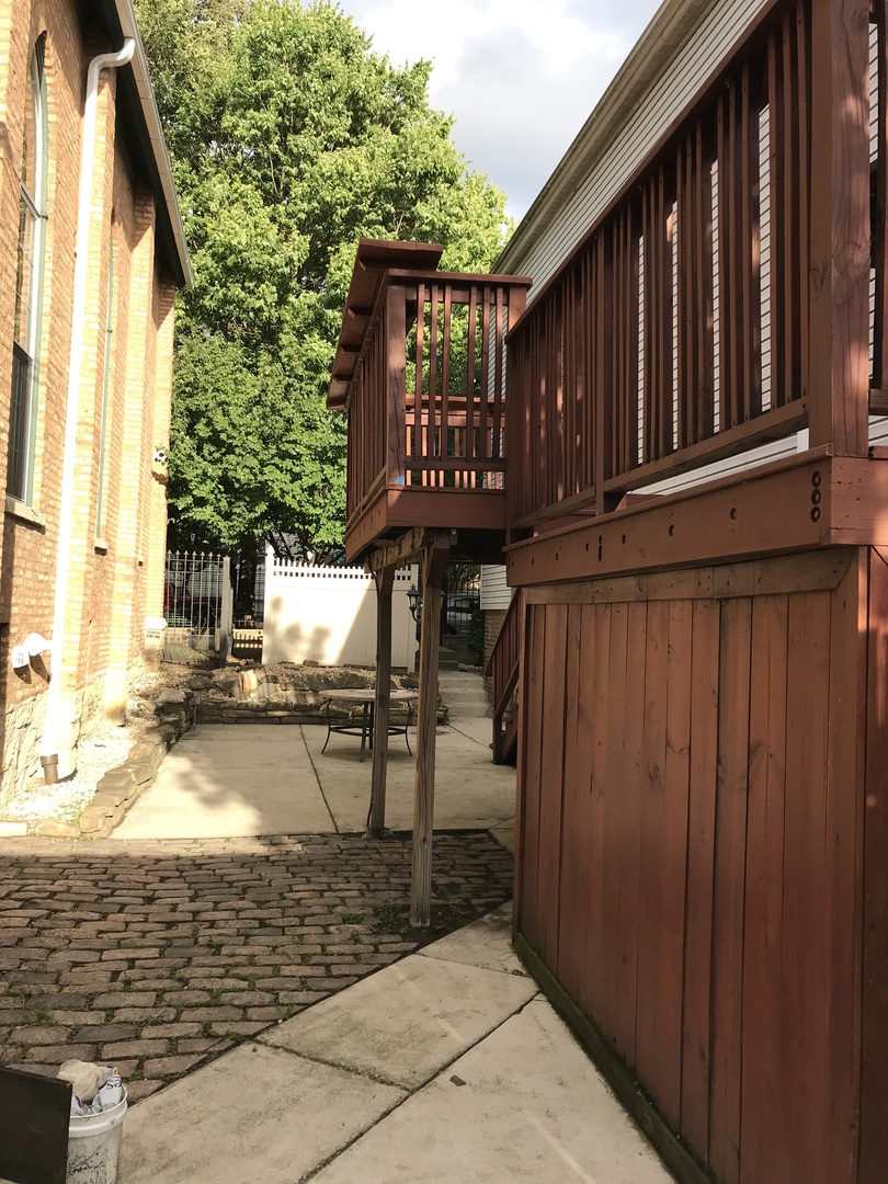 3110 South Racine Avenue Chicago, IL 60608 - Photo 21 of 23 a view of a house with backyard and sitting area