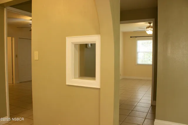 a view of a bathroom that has a glass door shower