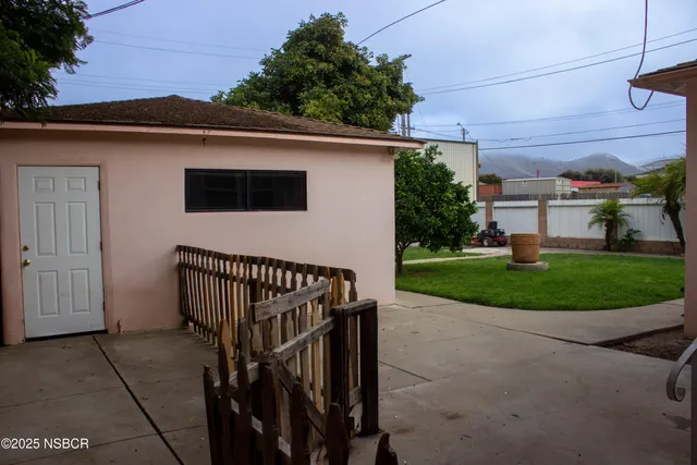 a view of a porch with a backyard