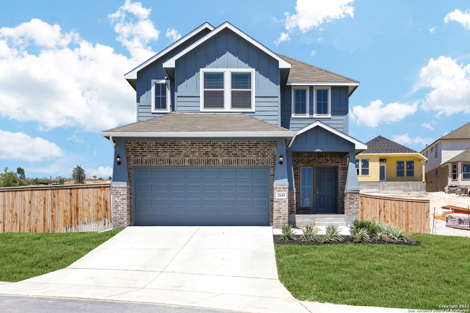 2645 White Willow San Antonio, TX 78245 - Photo 1 of 30 a front view of a house with a yard