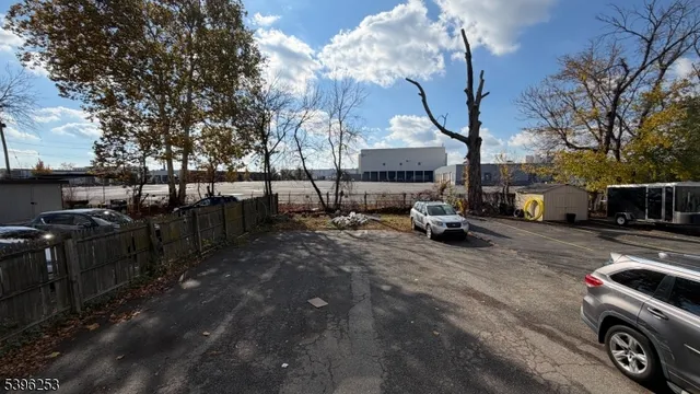 a view of parking with cars parked