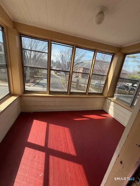 1694 Broad Street, Unit 2 Hartford, CT 06106 - Photo 4 of 10 a view of an empty room with a window