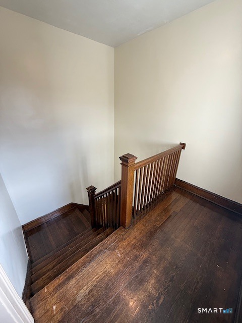 1694 Broad Street, Unit 2 Hartford, CT 06106 - Photo 6 of 10 a view of staircase with white walls