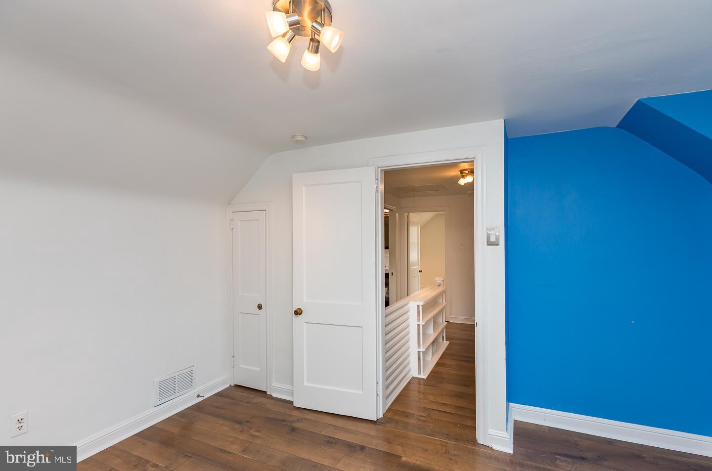 339 East Spring Avenue Ardmore, PA 19003 - Photo 30 of 44 a view of a hallway with wooden floor