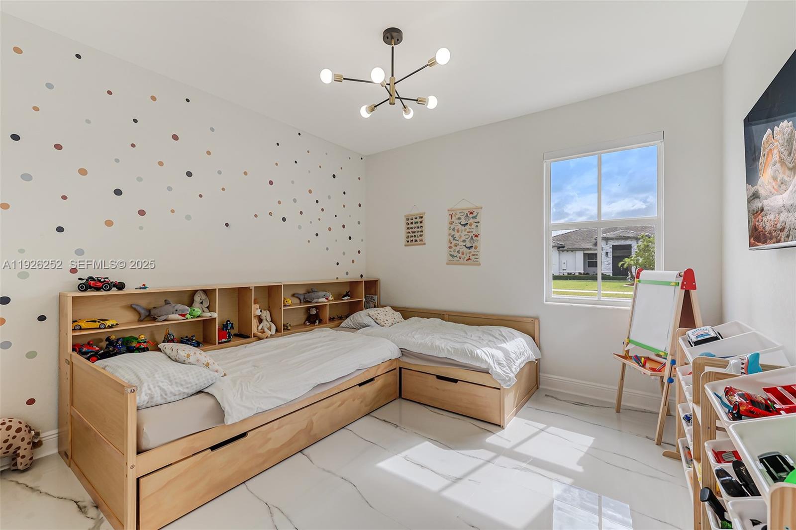 16753 Southwest 290th Street Homestead, FL 33030 - Photo 15 of 29 a bedroom with a bed and a window