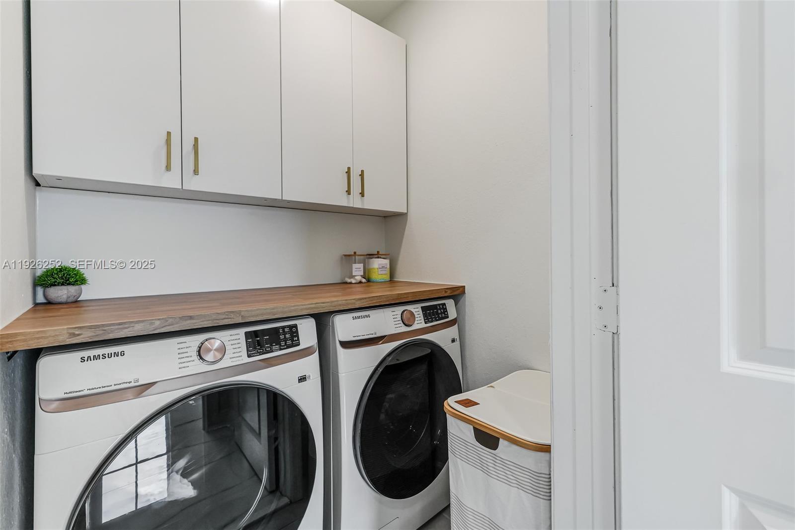16753 Southwest 290th Street Homestead, FL 33030 - Photo 18 of 29 a utility room with dryer and washer