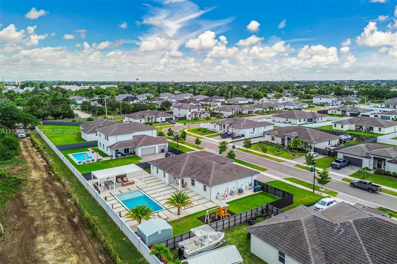 16753 Southwest 290th Street Homestead, FL 33030 - Photo 28 of 29 an aerial view of a house with a garden