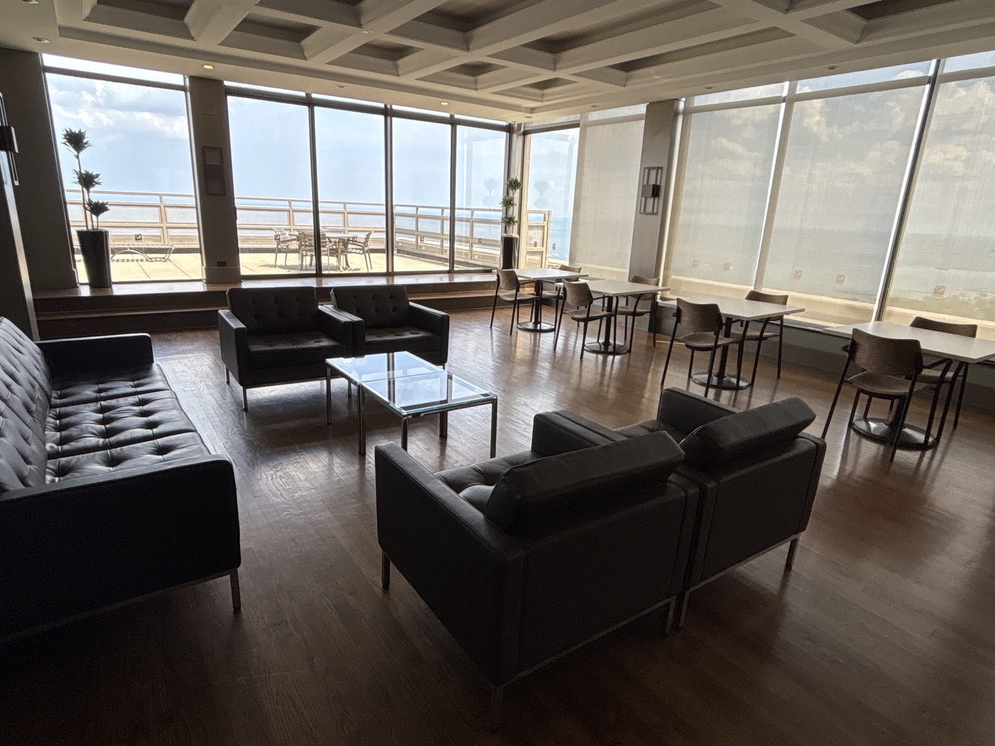 2650 North Lakeview Avenue, Unit 404 Chicago, IL 60614 - Photo 12 of 13 a living room with furniture and floor to ceiling windows