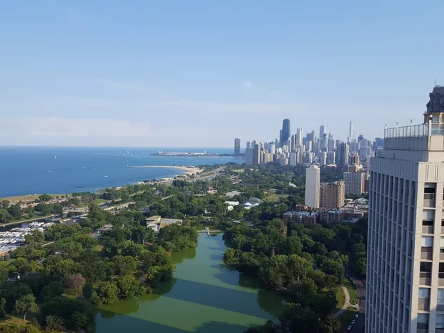a view of a city with tall buildings in background