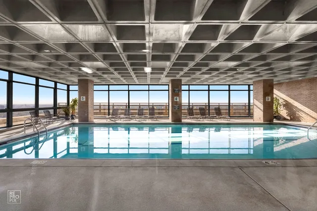 a view of a room with a large window