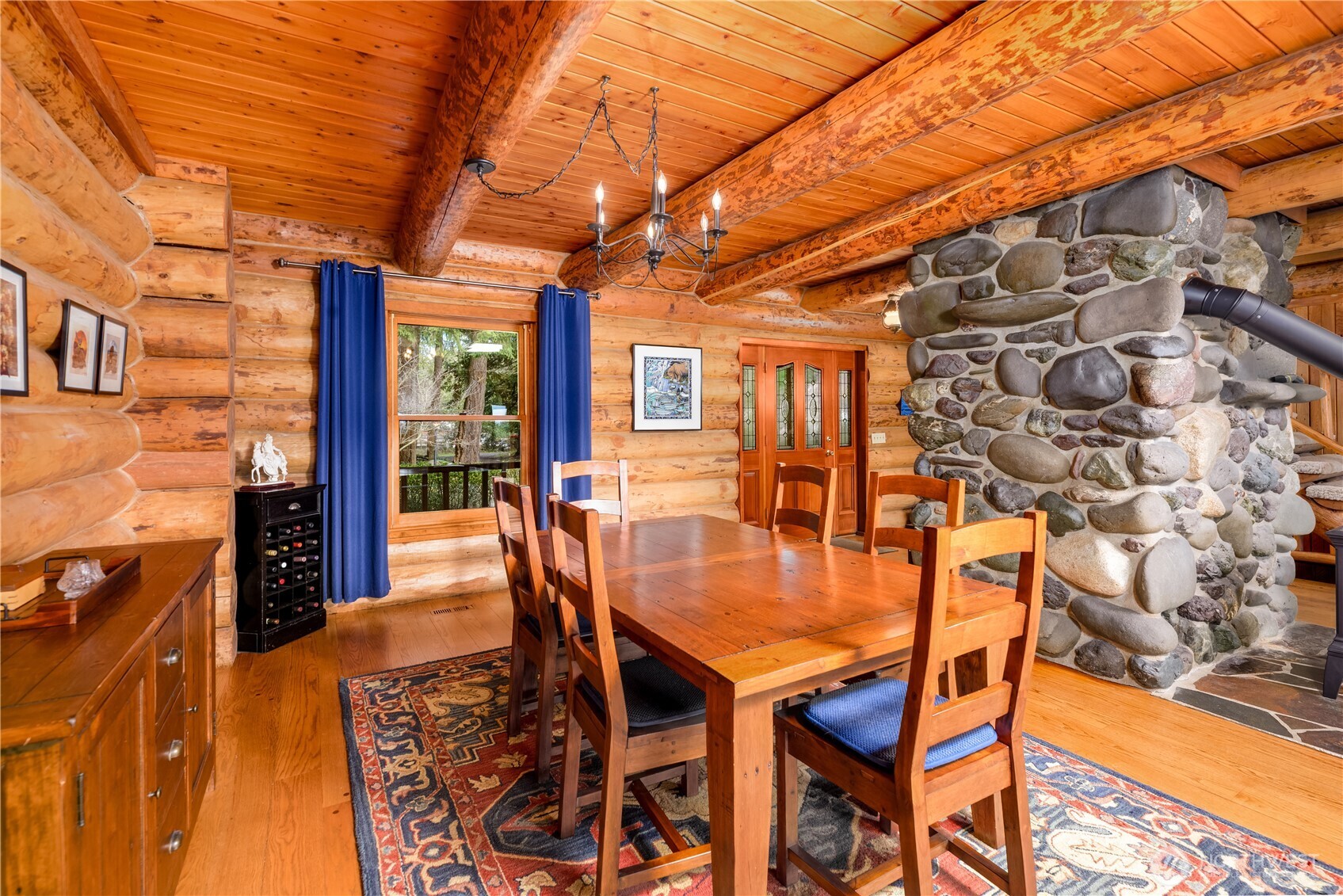 193 Snowberry Lane Sequim, WA 98382 - Photo 11 of 40 a dining room with furniture and wooden floor