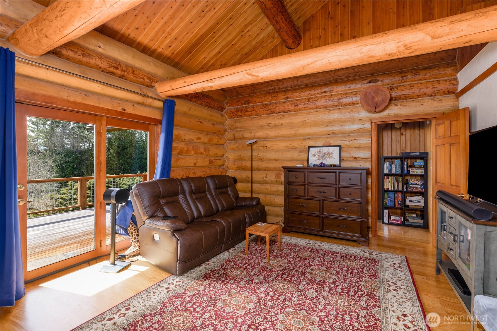 193 Snowberry Lane Sequim, WA 98382 - Photo 18 of 40 a living room with furniture a ceiling fan and a rug