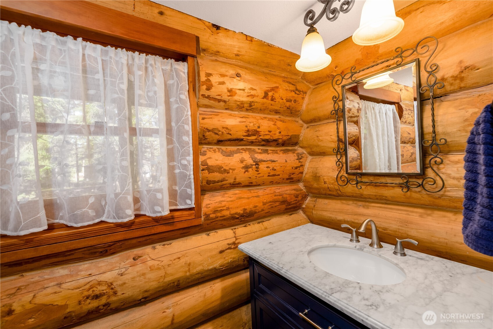 193 Snowberry Lane Sequim, WA 98382 - Photo 21 of 40 a bathroom with a granite countertop sink and a mirror