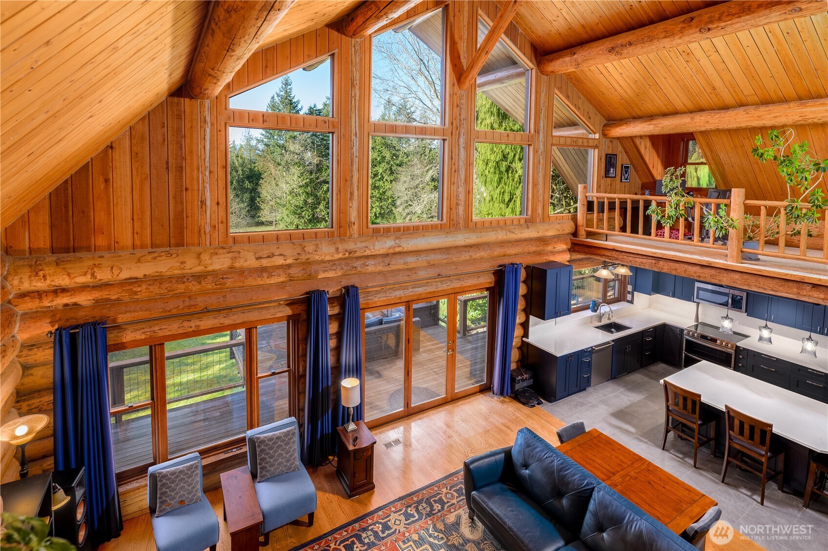 193 Snowberry Lane Sequim, WA 98382 - Photo 22 of 40 a living room filled with furniture and a window