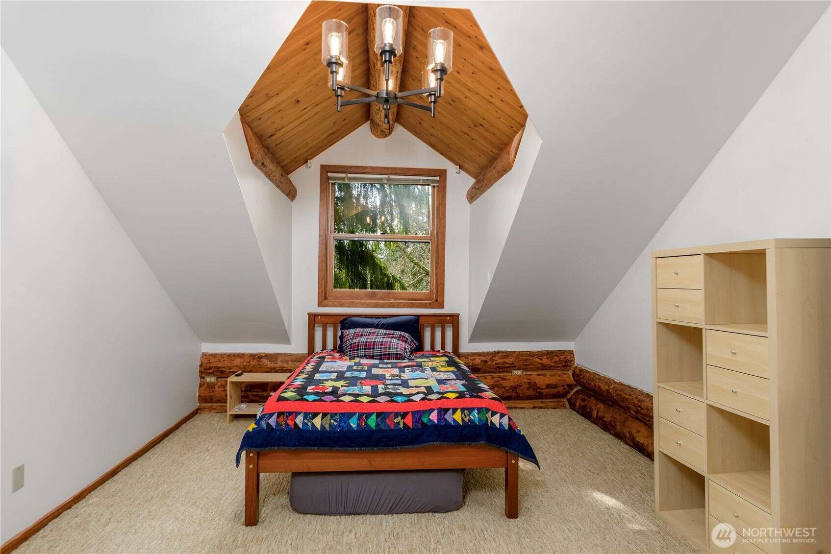 193 Snowberry Lane Sequim, WA 98382 - Photo 27 of 40 a bedroom with a bed and a window