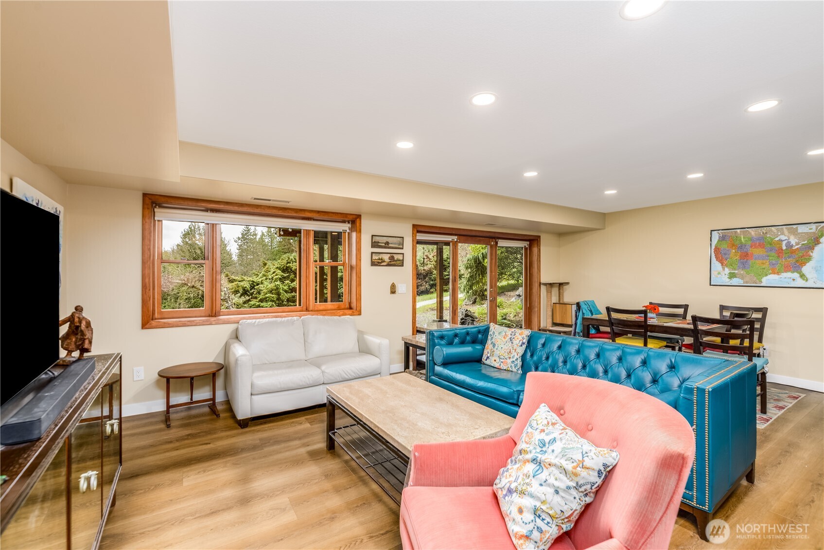 193 Snowberry Lane Sequim, WA 98382 - Photo 29 of 40 a living room with furniture and a flat screen tv
