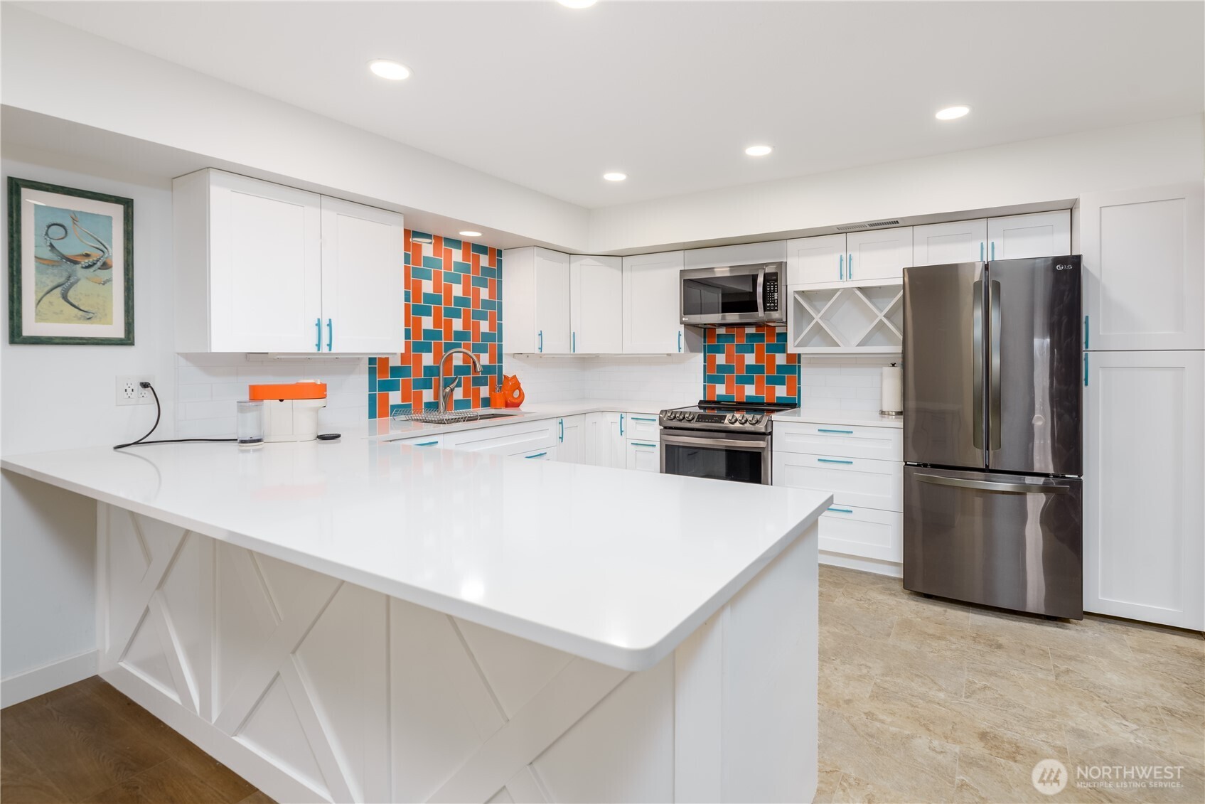193 Snowberry Lane Sequim, WA 98382 - Photo 30 of 40 a kitchen with a refrigerator and a sink