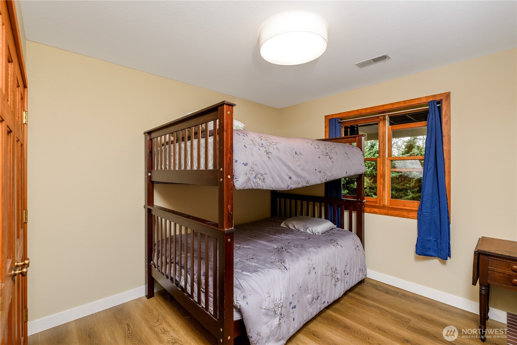 193 Snowberry Lane Sequim, WA 98382 - Photo 33 of 40 a bedroom with furniture and a window