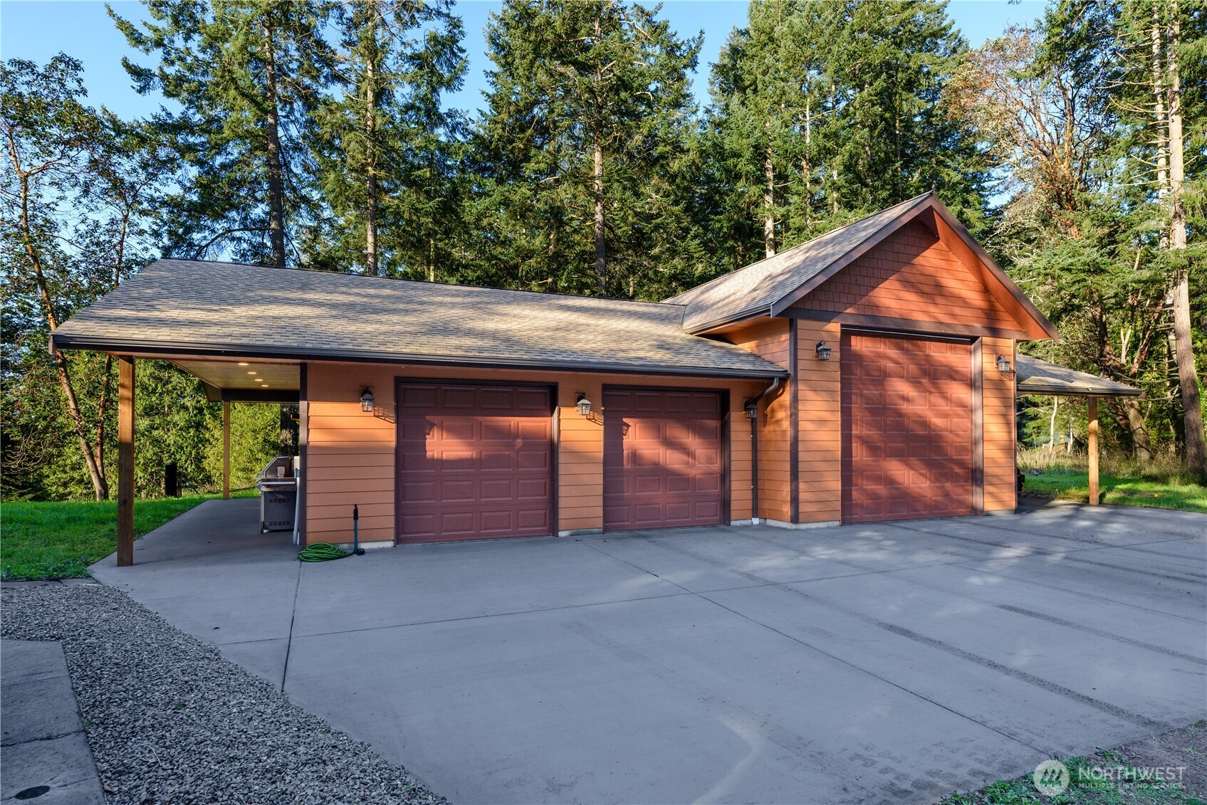 193 Snowberry Lane Sequim, WA 98382 - Photo 38 of 40 a front view of a house with a yard and garage