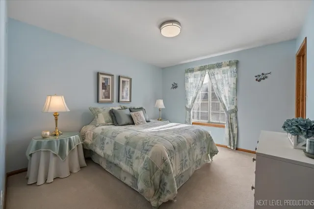 a view of a livingroom with furniture and a flat screen tv