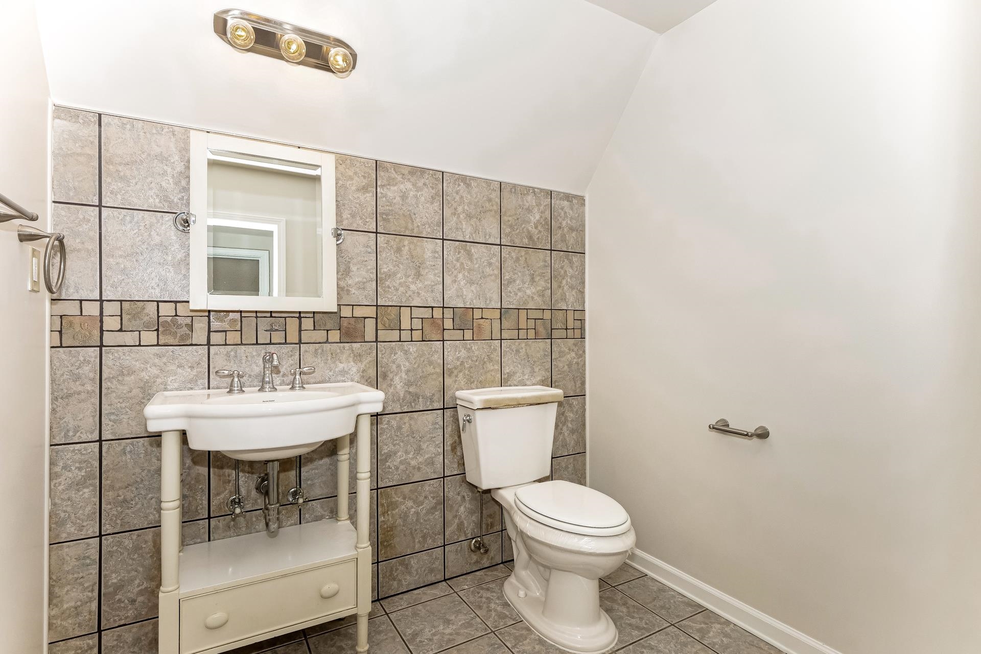 4290 Timber Jump Cove Memphis, TN 38141 - Photo 13 of 17 a bathroom with a sink a toilet and shower