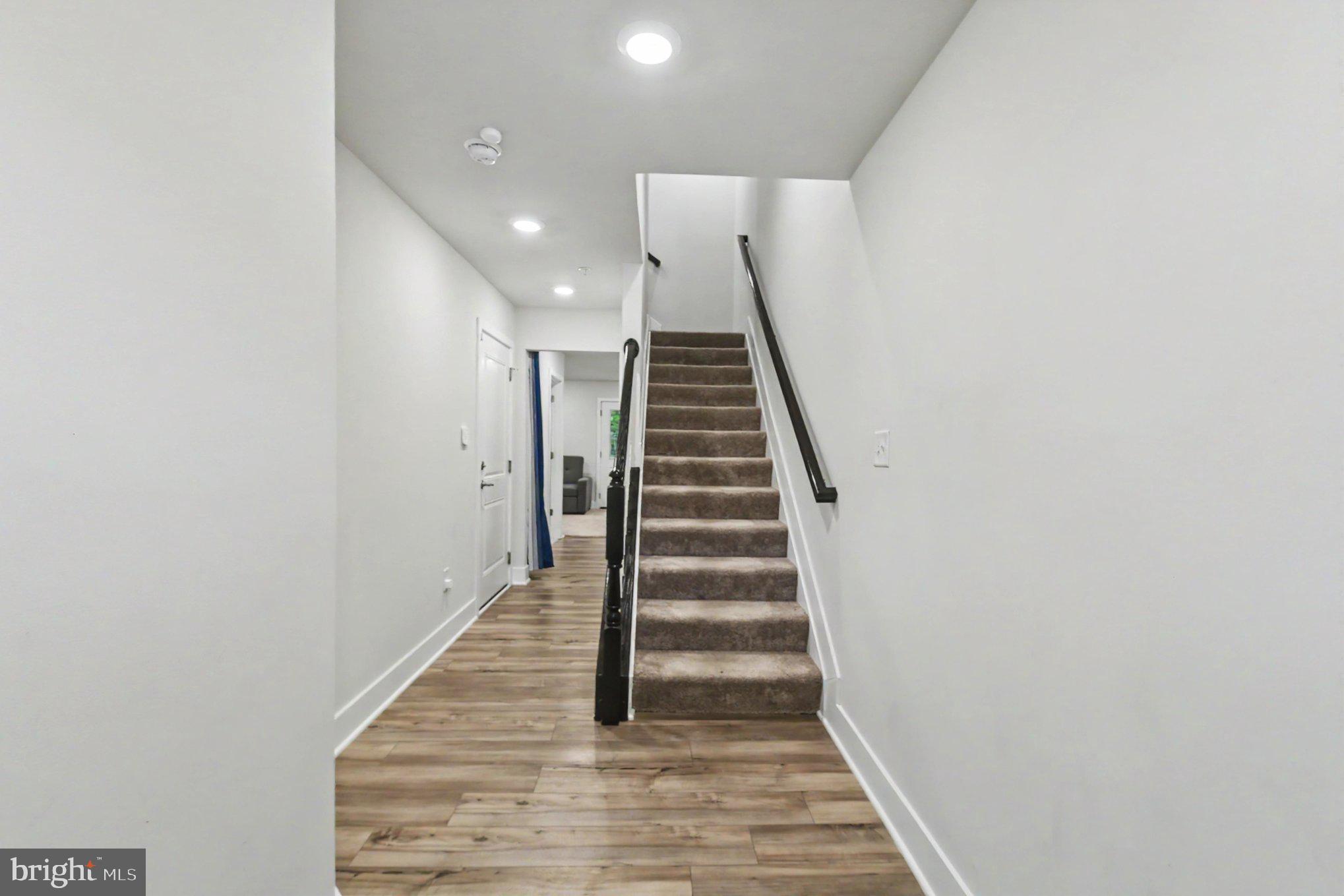238 Waterstone Road Essex, MD 21221 - Photo 5 of 39 a view of entryway and hall with wooden floor