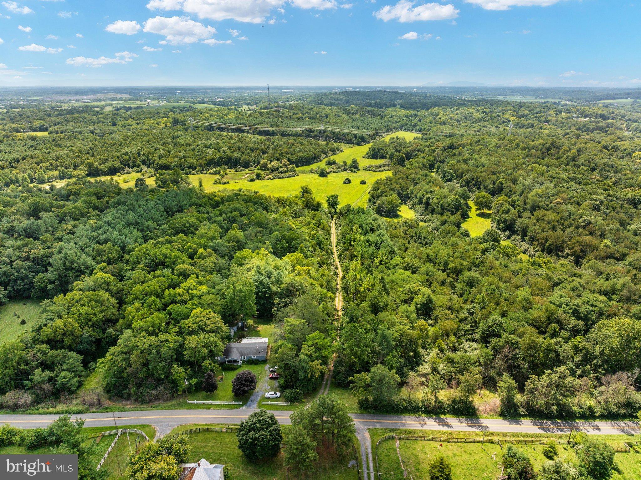 Lot 15 Rest Church Road Clear Brook, VA 22624 - Photo 8 of 29 Lush green landscape under a bright sky.