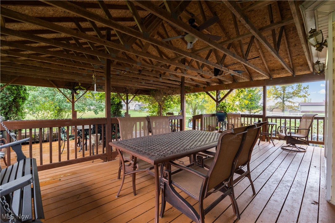 14951 Rickel Road West Salem, OH 44287 - Photo 43 of 46 Wooden deck with outdoor dining space