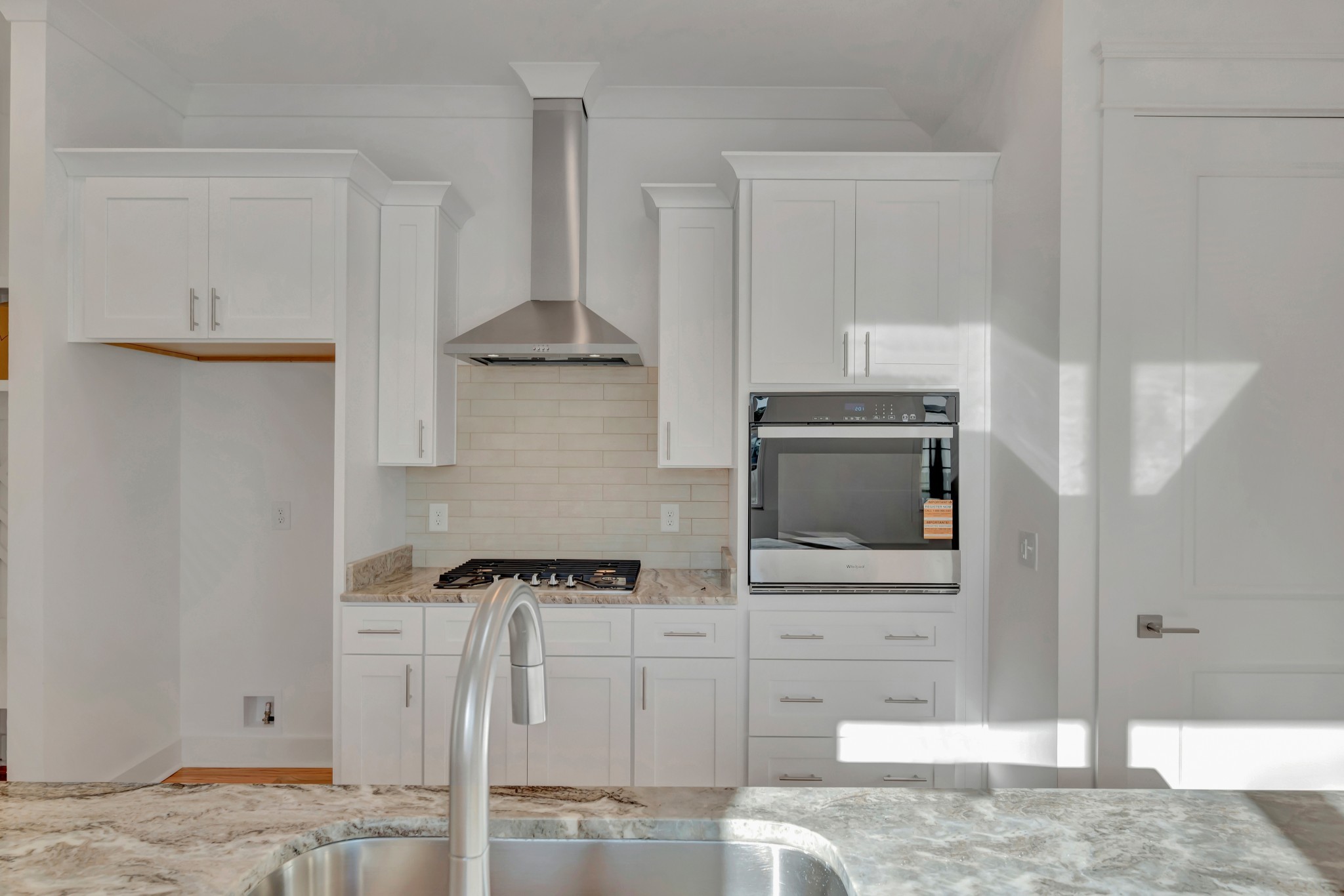 520 Croley Drive, Unit A (RIGHT SIDE) Nashville, TN 37209 - Photo 13 of 39 a kitchen with stainless steel appliances kitchen island granite countertop a refrigerator and a stove