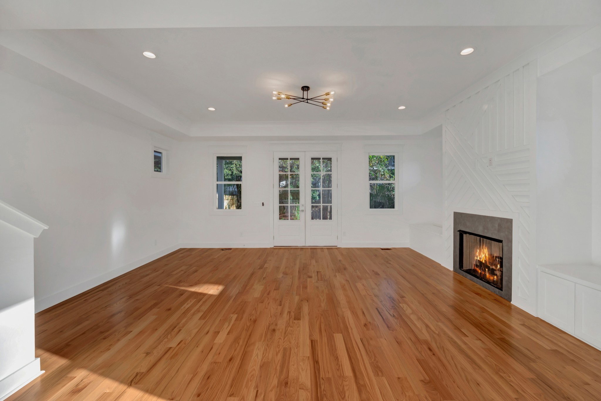 520 Croley Drive, Unit A (RIGHT SIDE) Nashville, TN 37209 - Photo 16 of 39 a view of empty room with wooden floor and fan